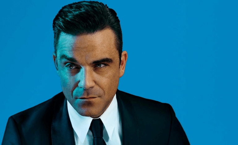 O Robbie Williams τραγουδάει “Can’t Stop Christmas”