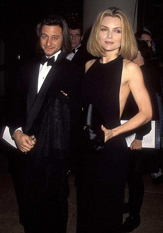 Michelle Pfeiffer and Fisher Stevens at an event for The 49th Annual Golden Globe Awards 1992 min