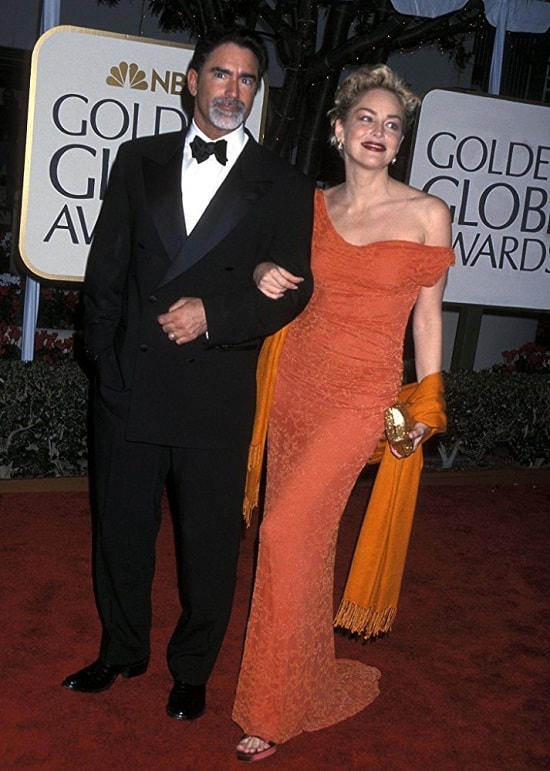 Sharon Stone and Phil Bronstein at an event for The 56th Annual Golden Globe Awards 1999 min