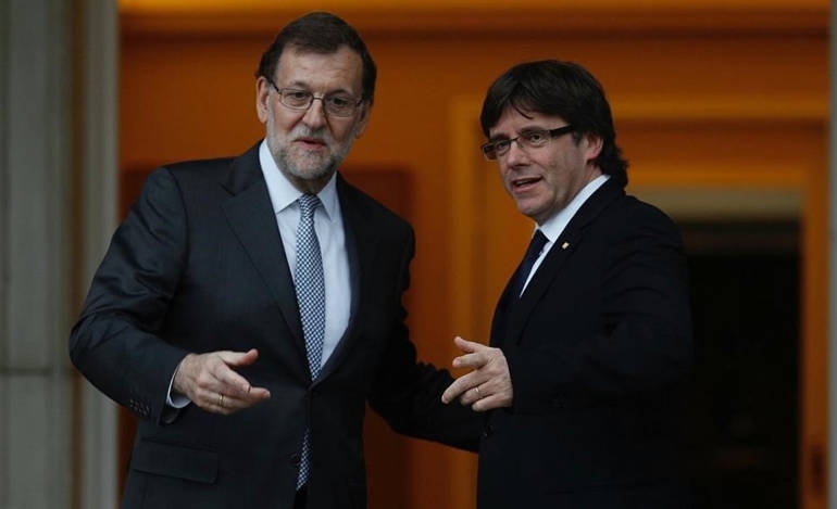Ο πρόεδρος της Καταλονίας Κάρλες Πουτζδεμόν και ο Ισπανός πρωθυπουργός, Μαριάνο Ραχόι,